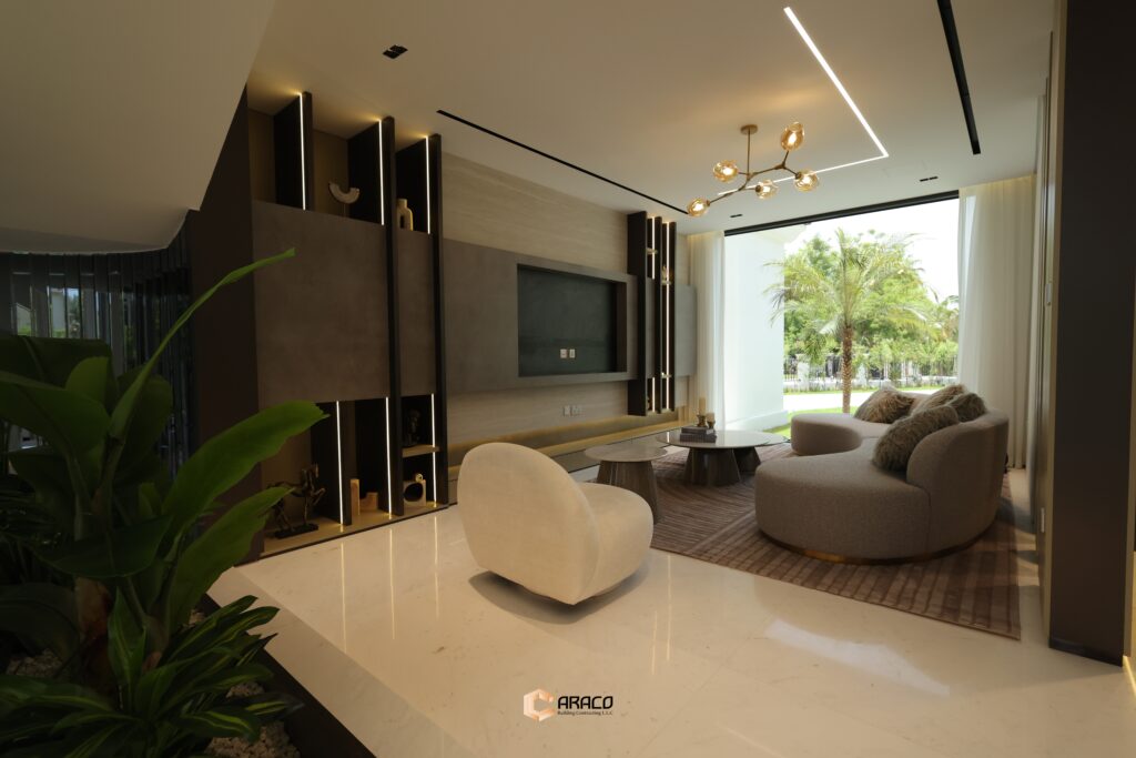Cozy TV room with modern entertainment setup and comfortable seating | Caraco Building Contracting