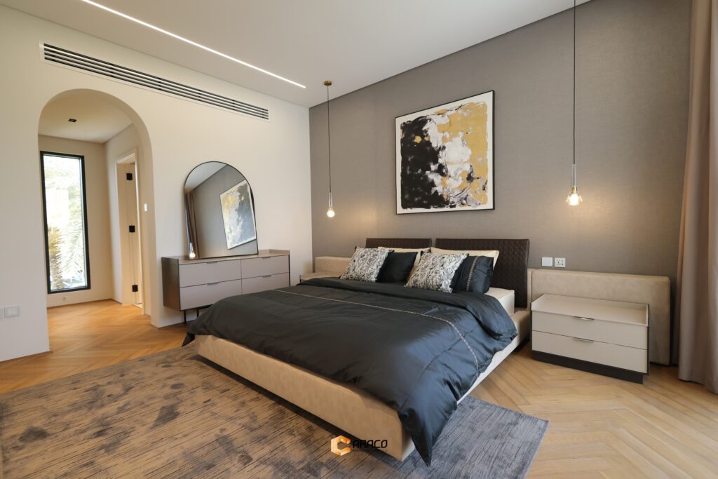 Spacious bedroom with elegant design and natural light | Caraco Building Contracting